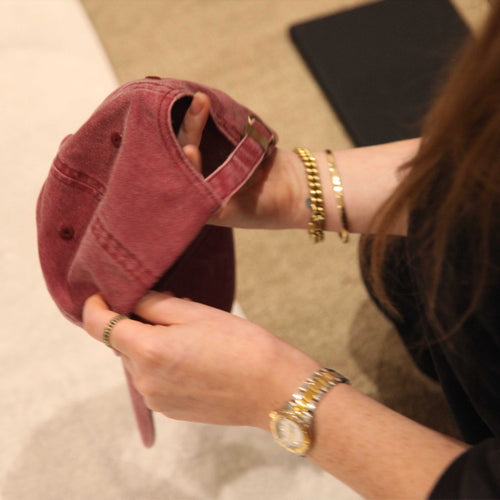 Back of Burgundy TGC Cap. 